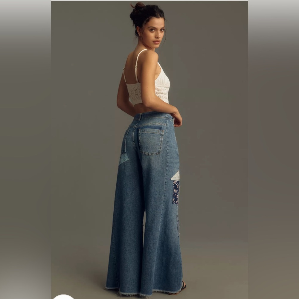 The Adi Mid-Rise Patchwork Frayed Relaxed Flare Jeans From Anthropologie - Picture 3 of 7
